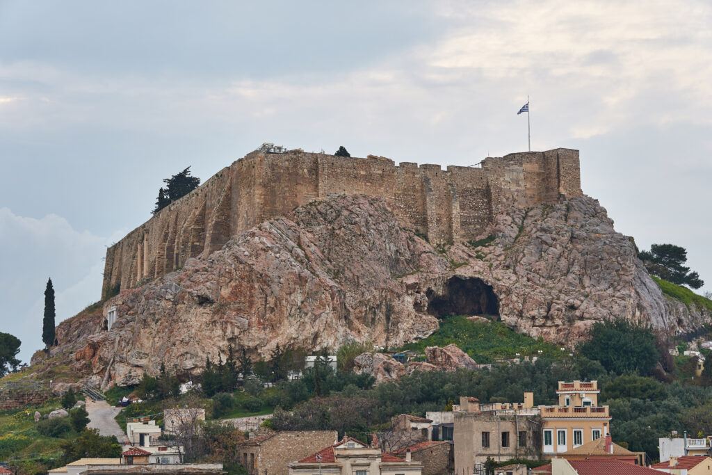 The Acropolis of Athens glowing above the Plaka rooftops