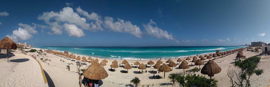 Playa Delfines beach Cancun with white sand and turquoise water