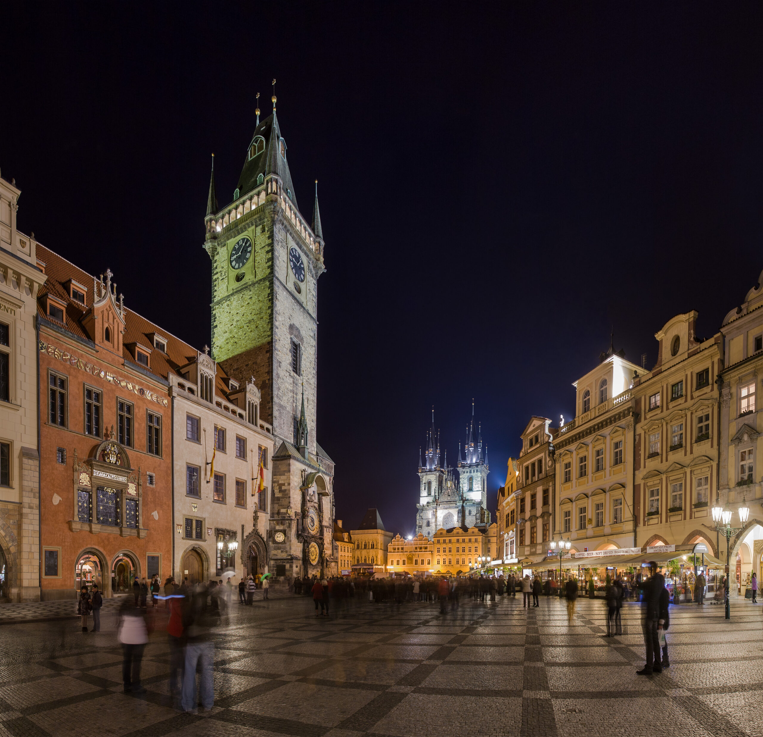 Old Town Square with the Týn Church towers and Baroque facades in Prague