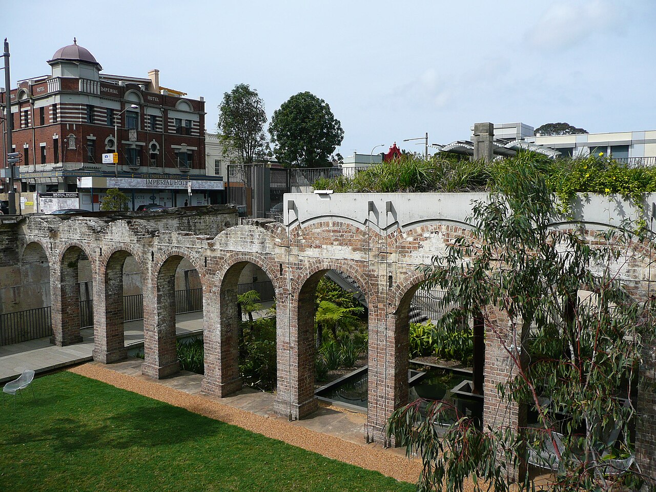 Heritage brick arches of the sunken Paddington Reservoir Gardens in Sydney