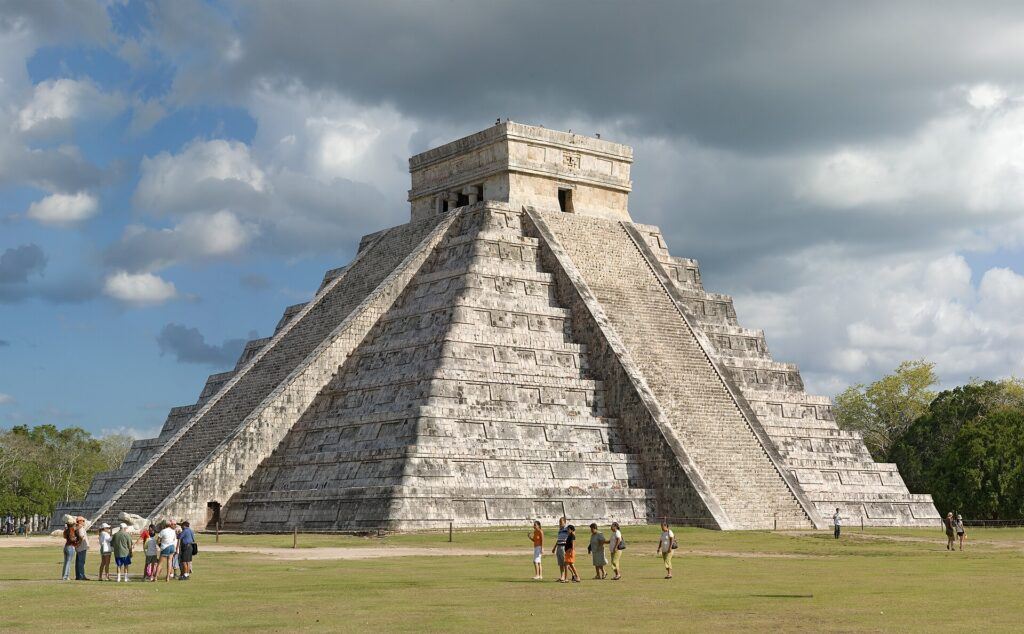 El Castillo pyramid at Chichen Itza Mexico under blue sky