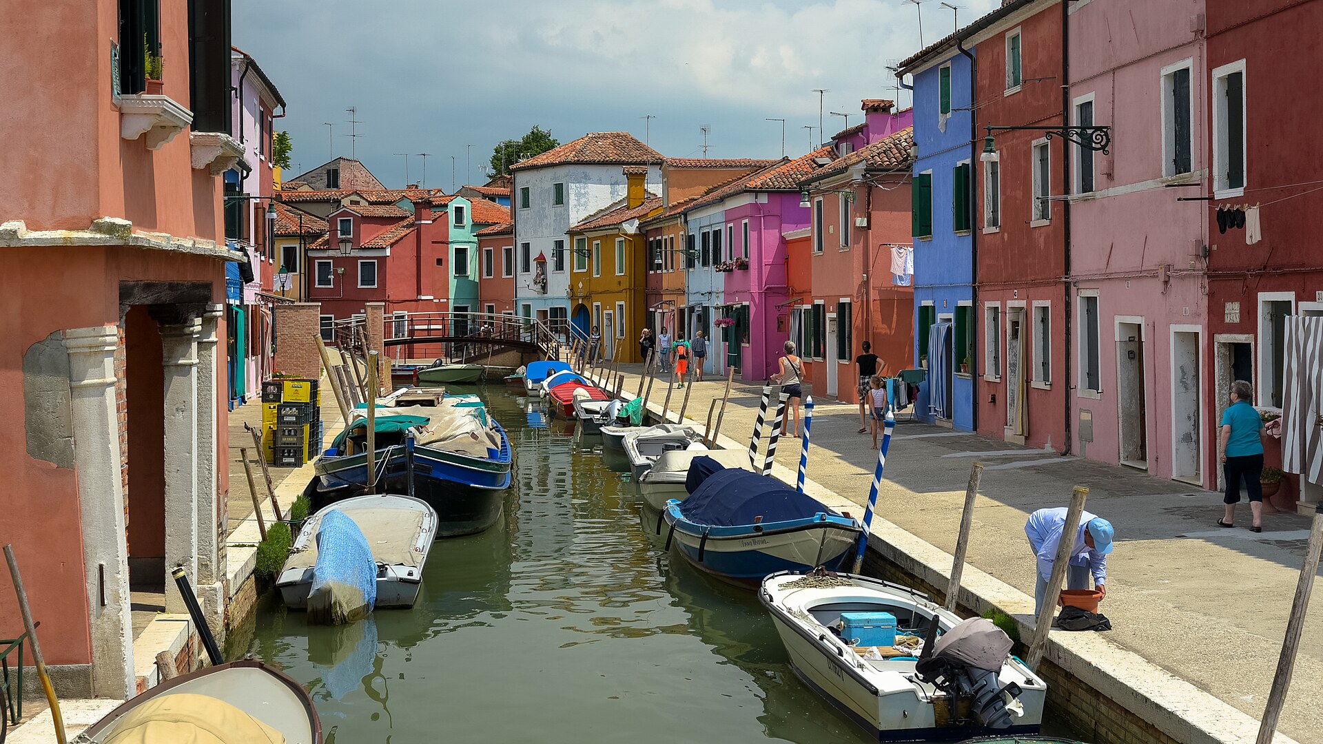 Colorful houses along a canal in Burano, Venice