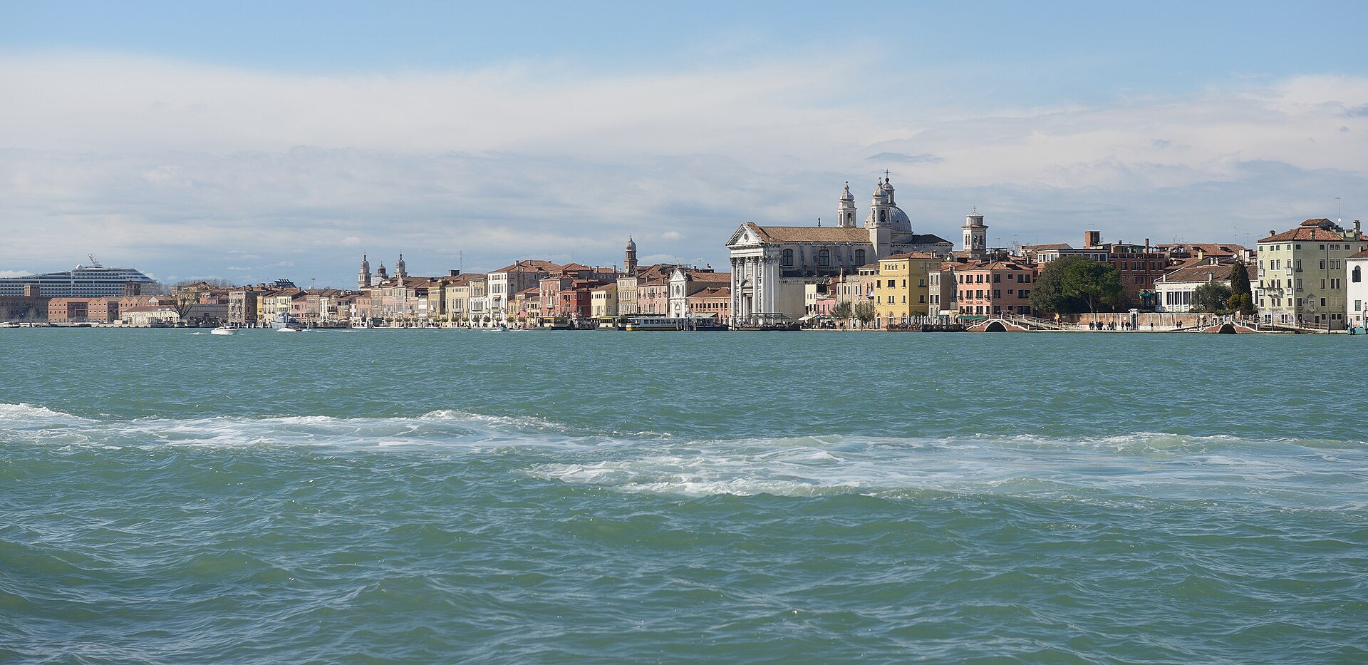 Giudecca island across the water with the Redentore church, Venice