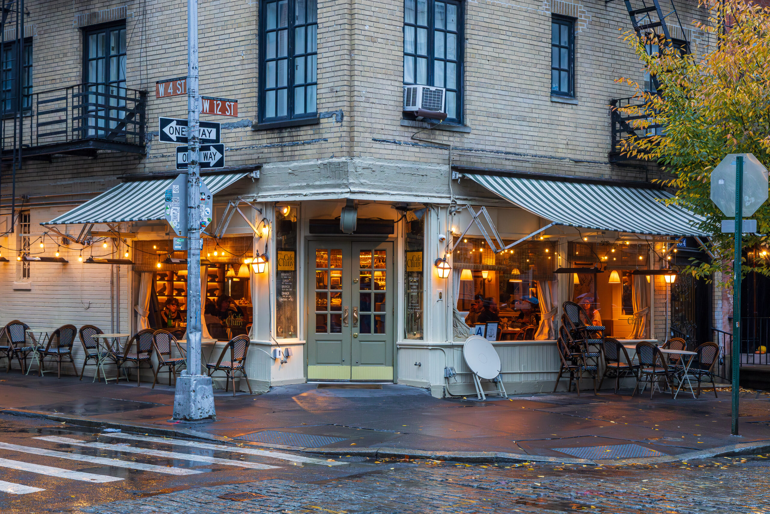 Brownstone-lined street corner in Greenwich Village