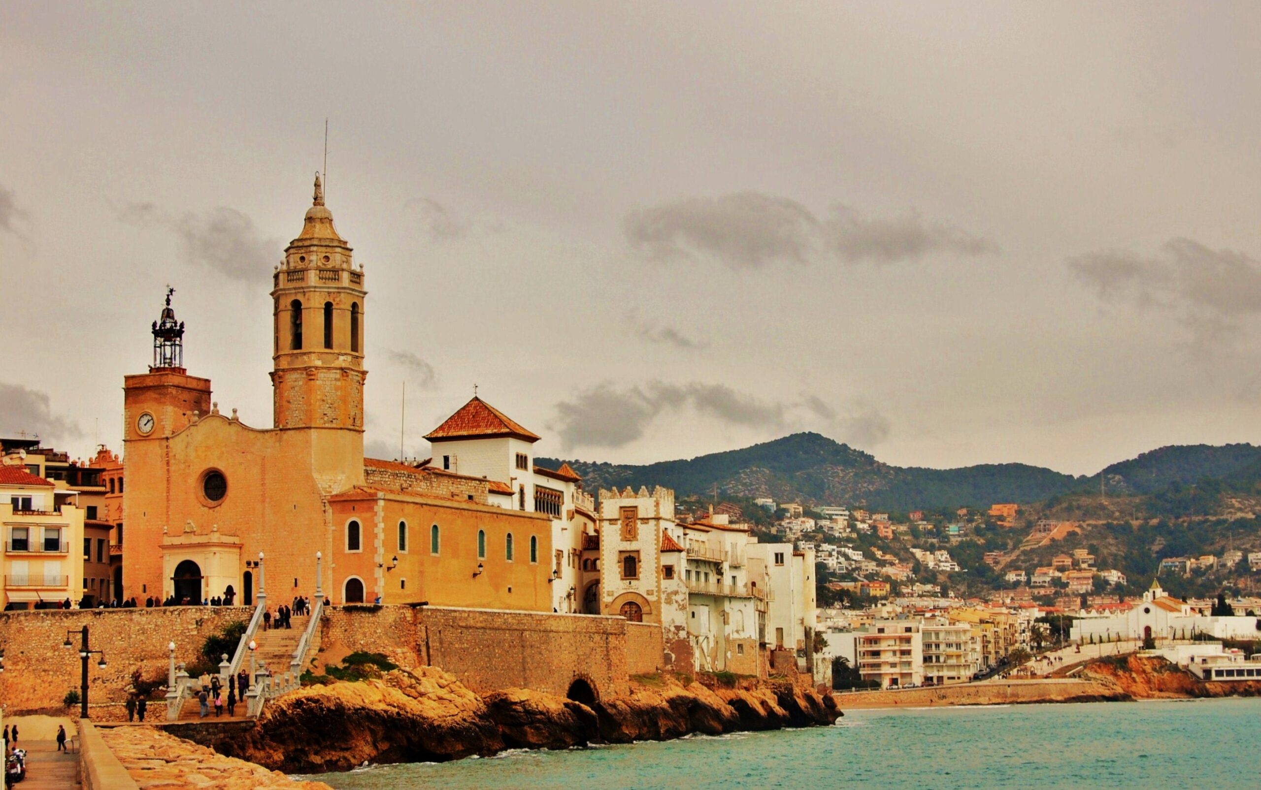 The church of Sant Bartomeu i Santa Tecla above the beach in Sitges