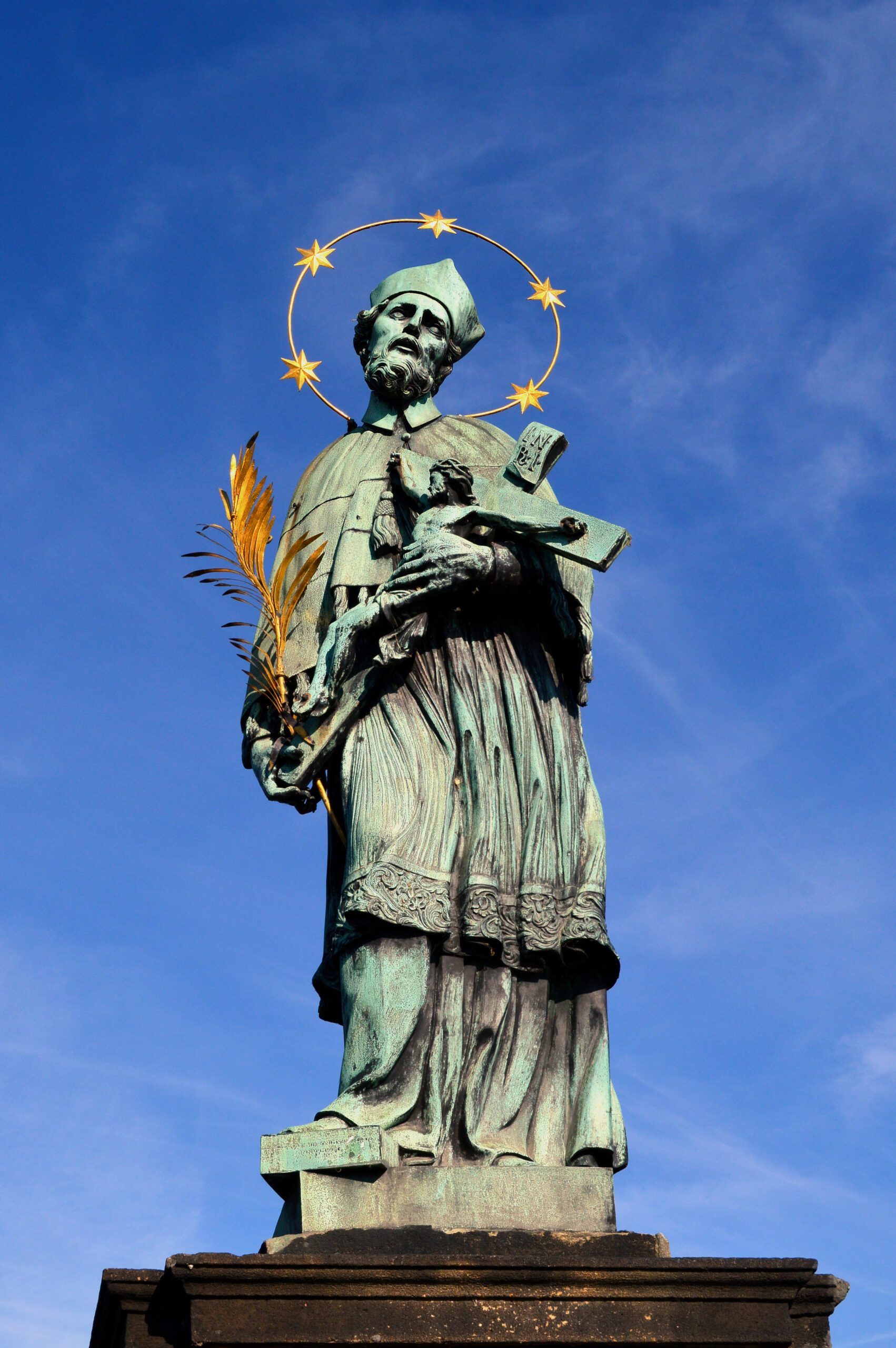Statues on Charles Bridge with the Old Town Bridge Tower in Prague