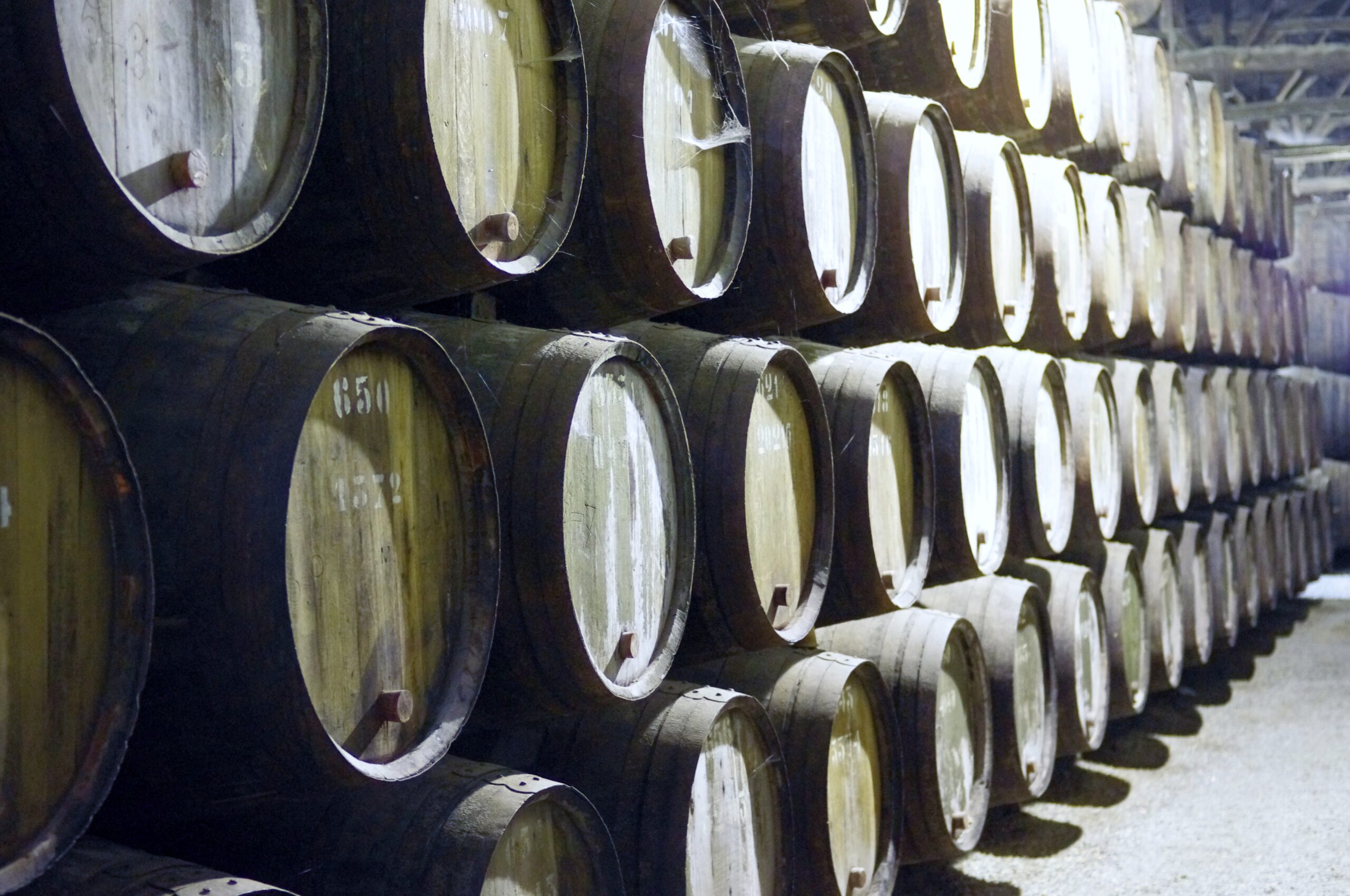 Port wine barrels aging in a Vila Nova de Gaia cellar