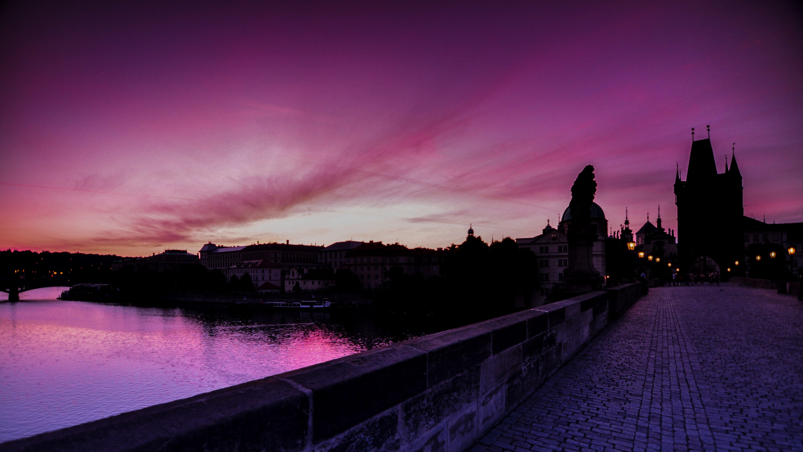 Charles Bridge at sunrise, quiet before the crowds