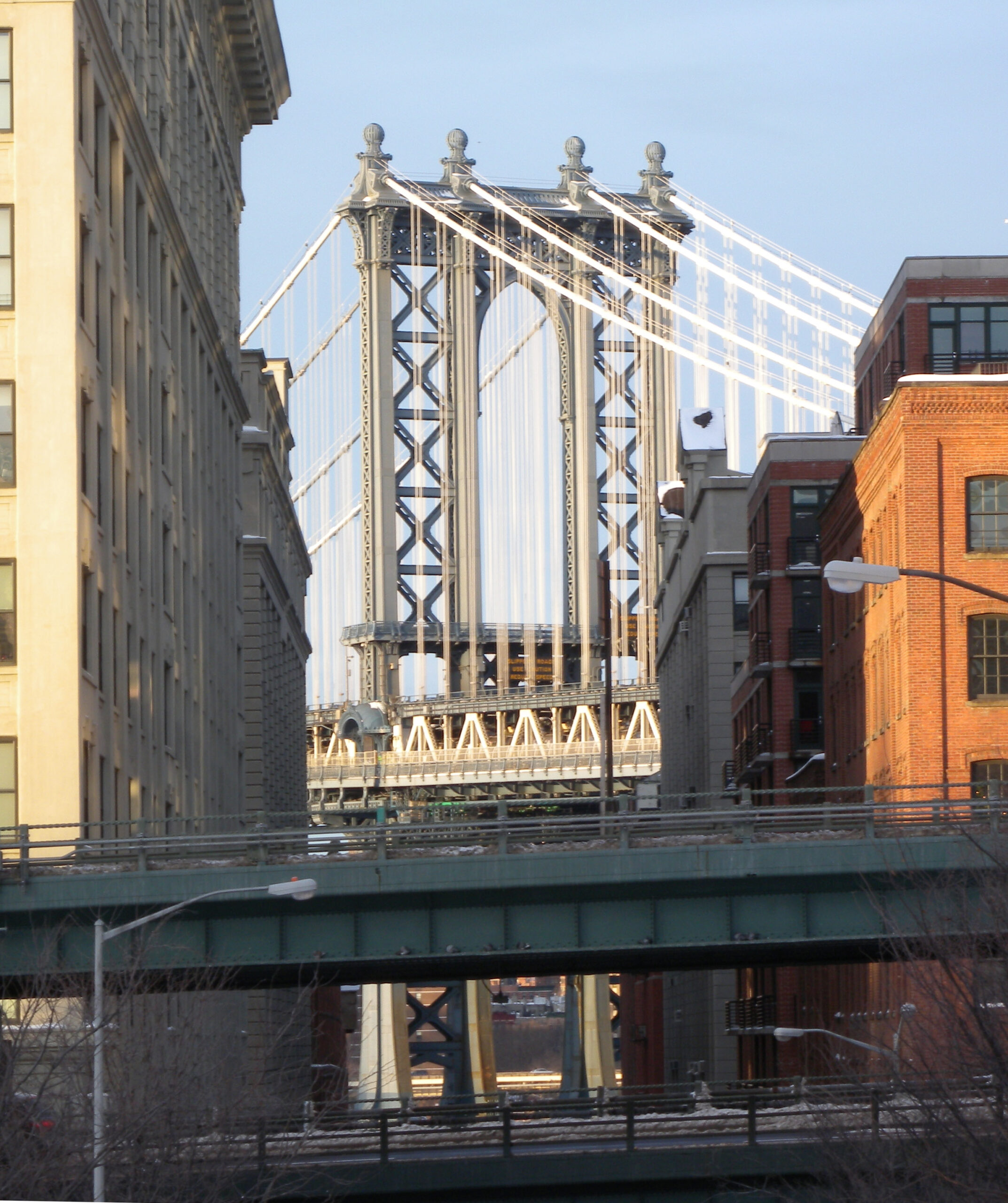 Manhattan Bridge framed by warehouses on Washington Street, DUMBO Brooklyn