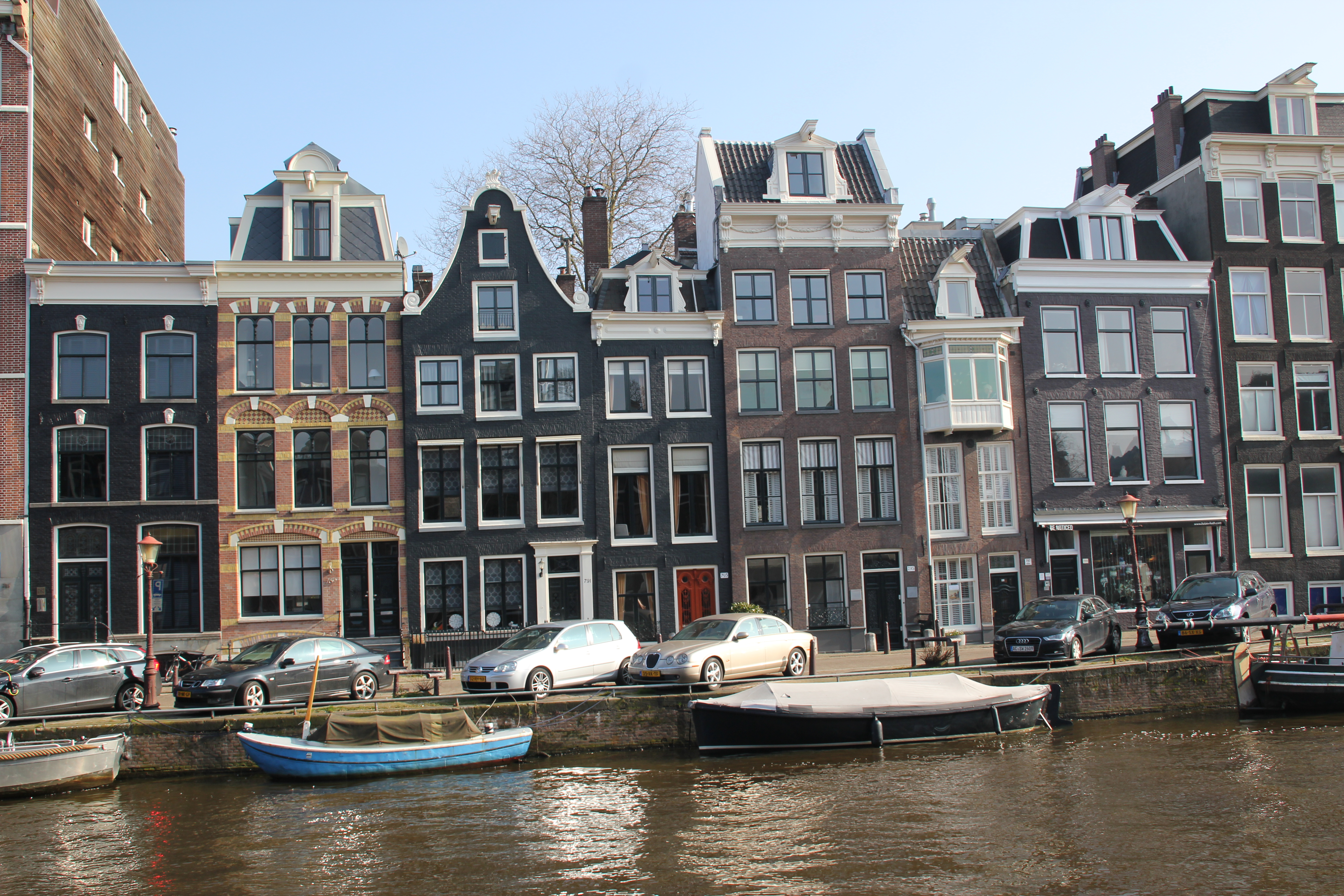 Amsterdam canal lined with historic canal houses