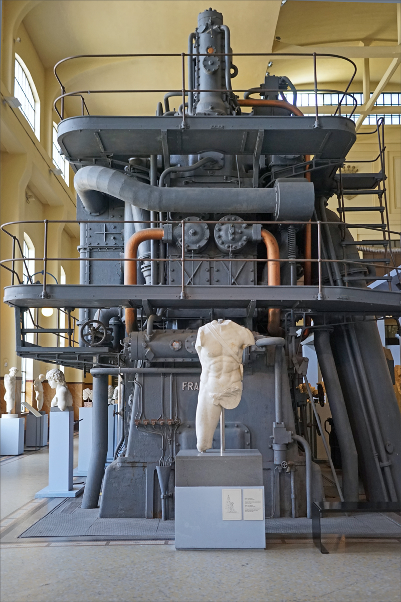 Ancient Roman sculptures displayed inside the Centrale Montemartini power station museum in Rome