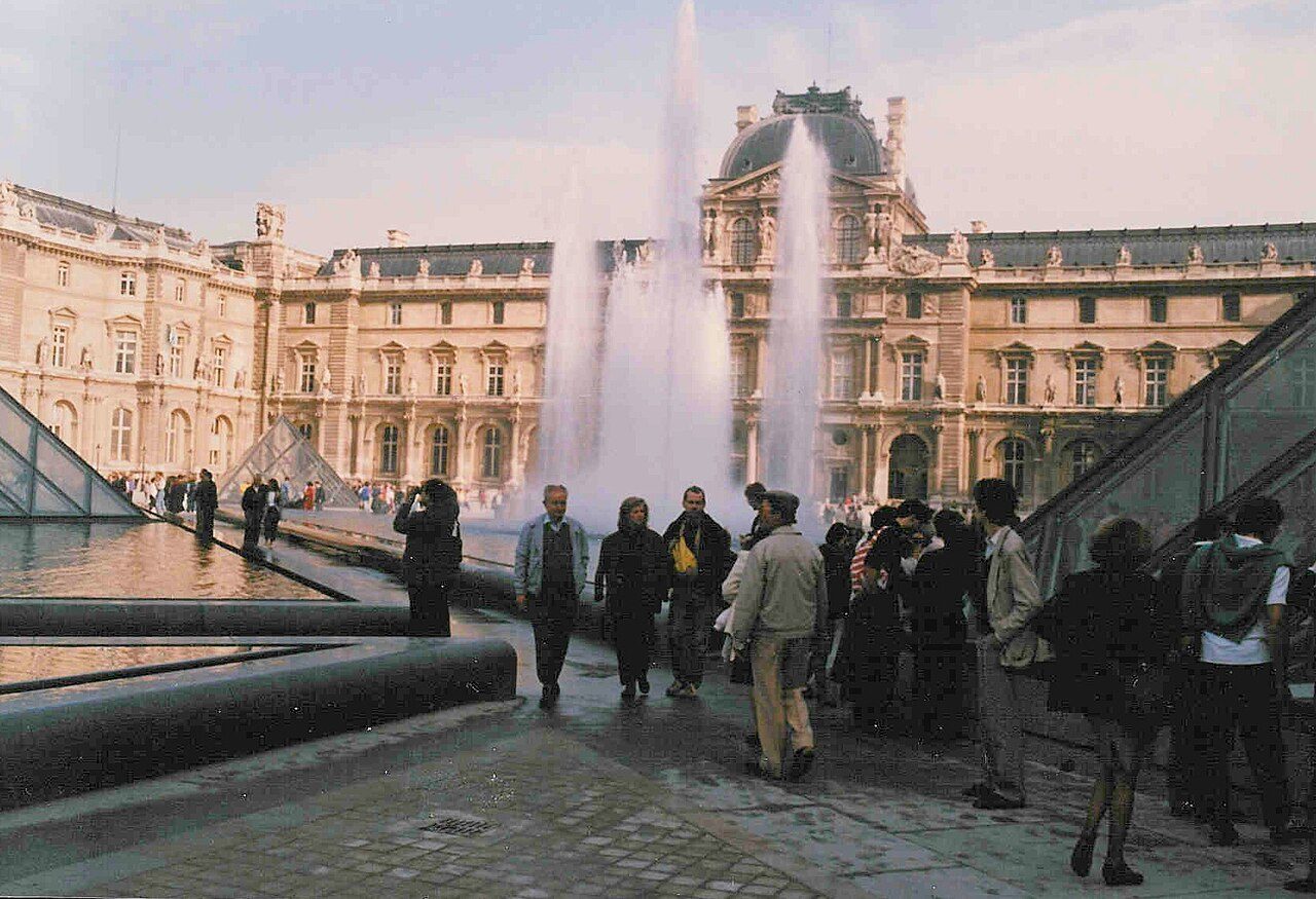 Glass Louvre Pyramid in the Cour Napoléon courtyard in Paris