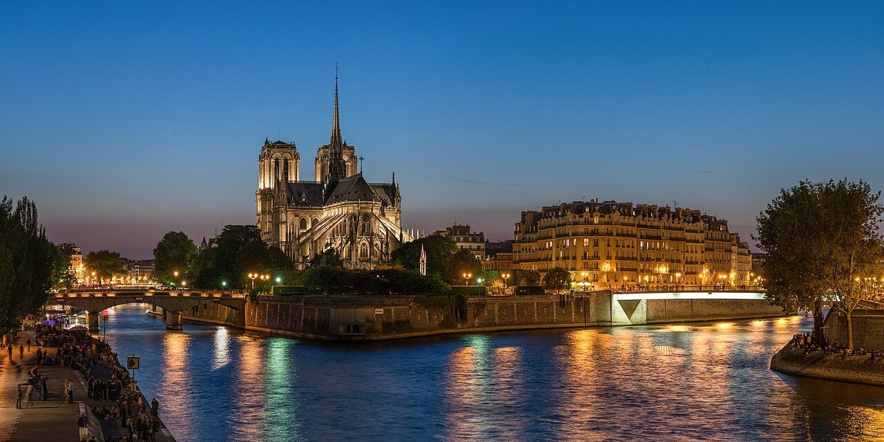 Notre-Dame Cathedral and Île de la Cité at dusk from the Seine River in Paris