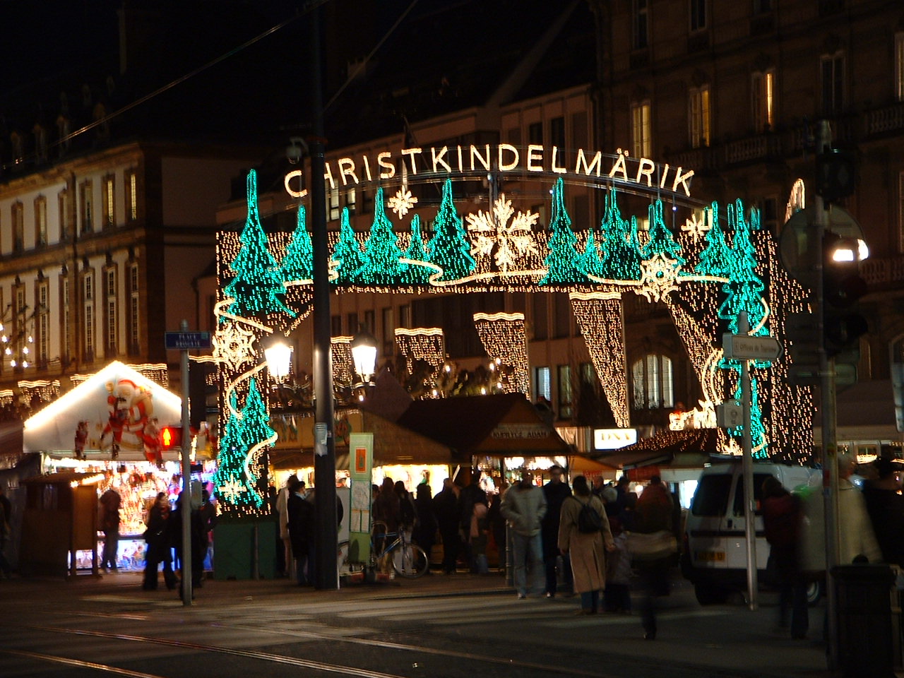 Strasbourg Christmas market entrance arch with illuminated Christkindelmärik sign