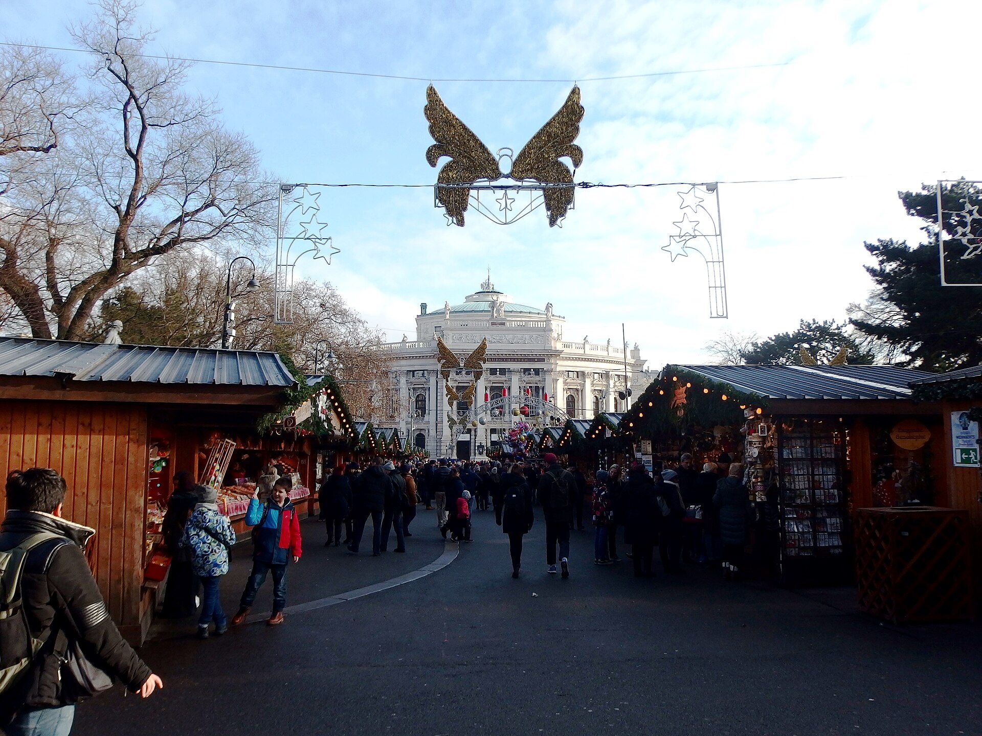 Vienna Christmas market at Rathausplatz with stalls and the Burgtheater