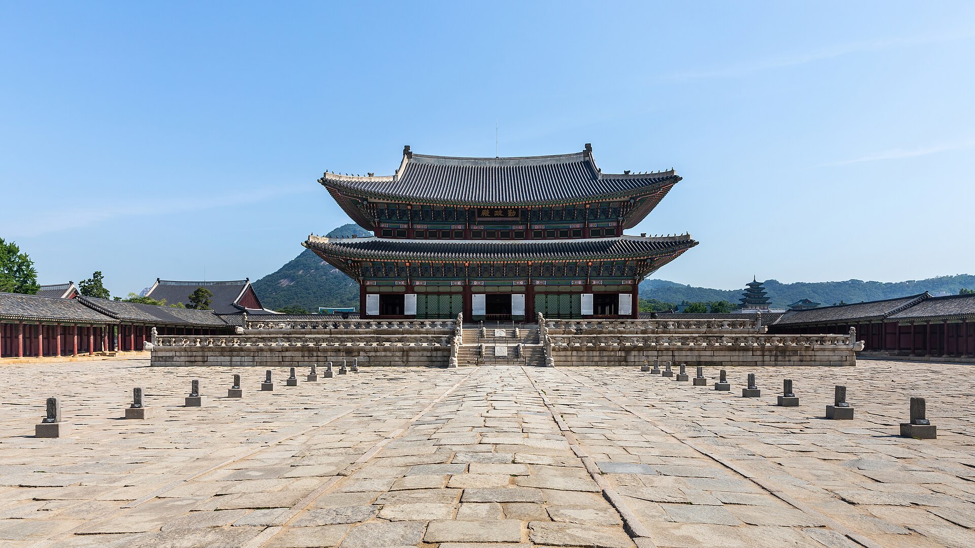 Gyeongbokgung Palace throne hall Geunjeongjeon under a blue sky in Seoul