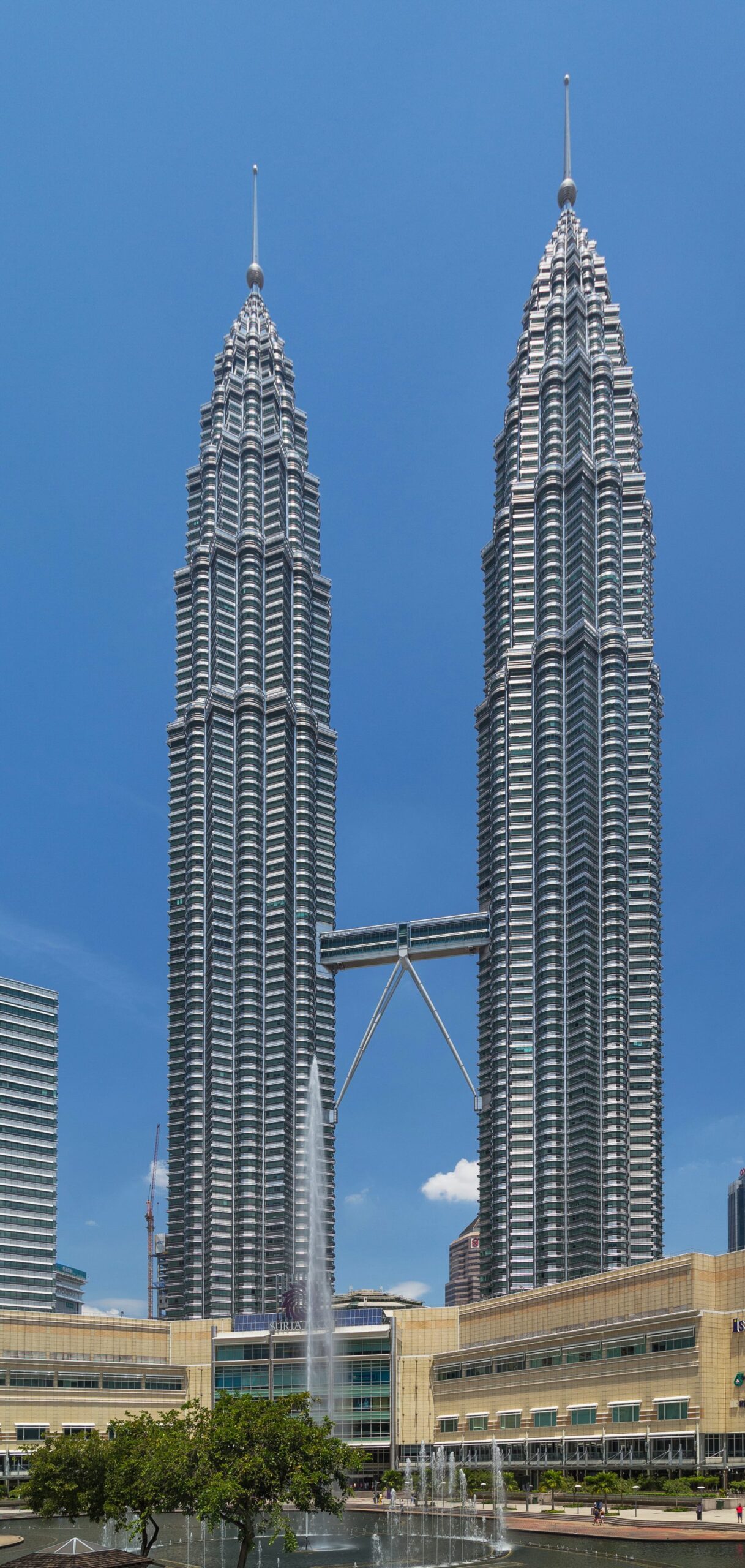 Petronas Twin Towers rising above KLCC Park in Kuala Lumpur
