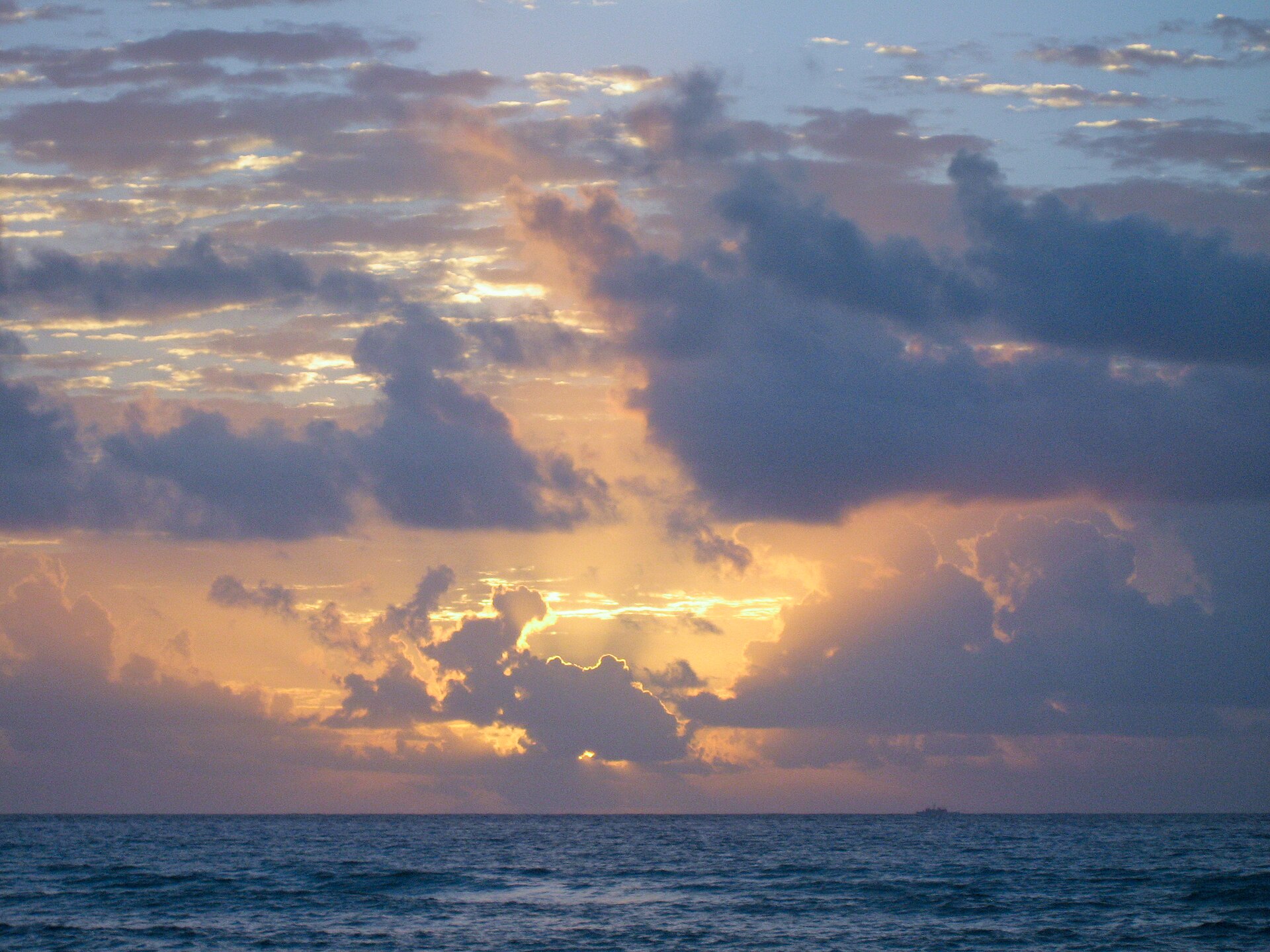 Turquoise water and sunrise over the beach in Playa del Carmen