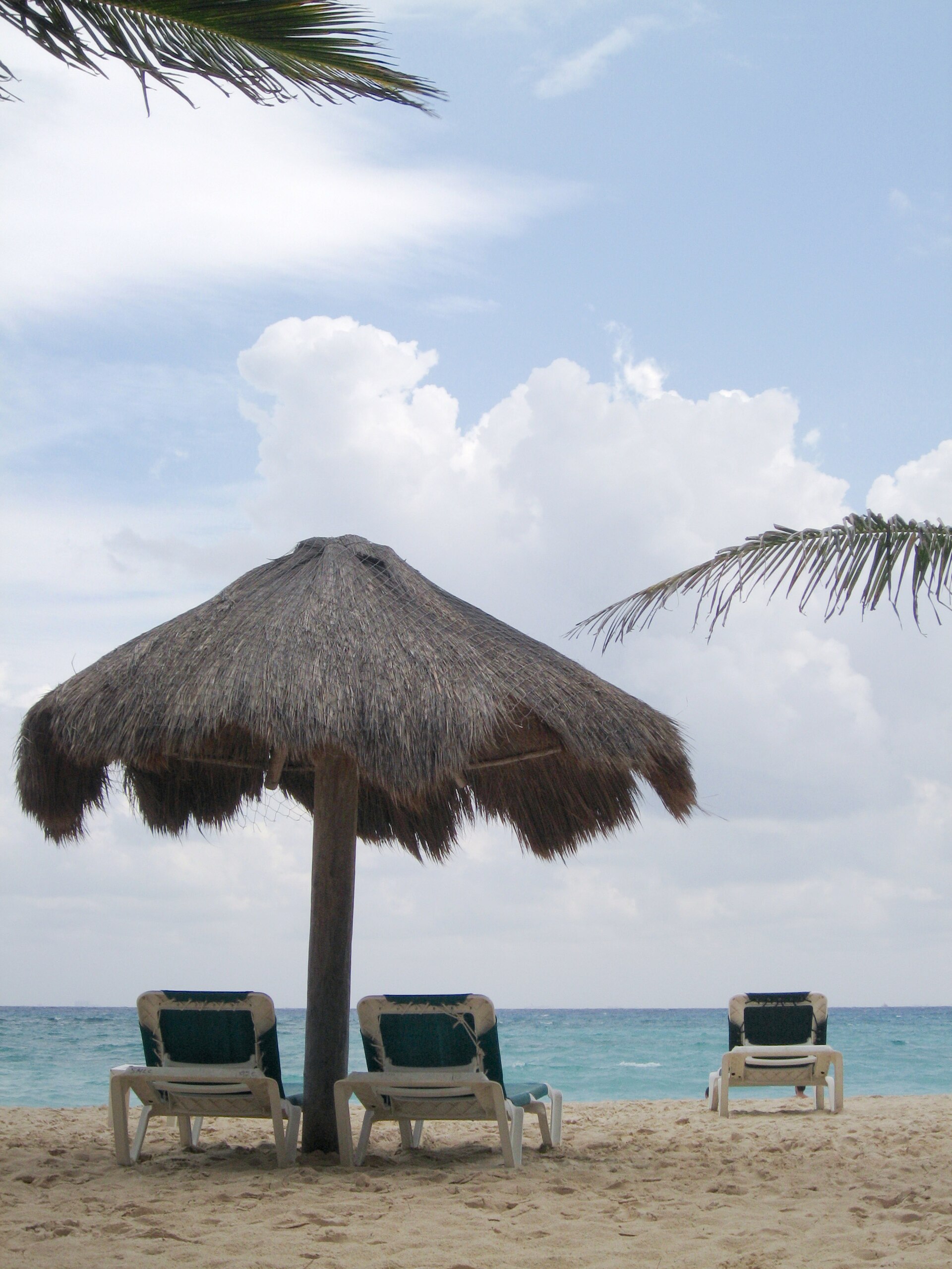 Beach chairs on the sand in Playa del Carmen