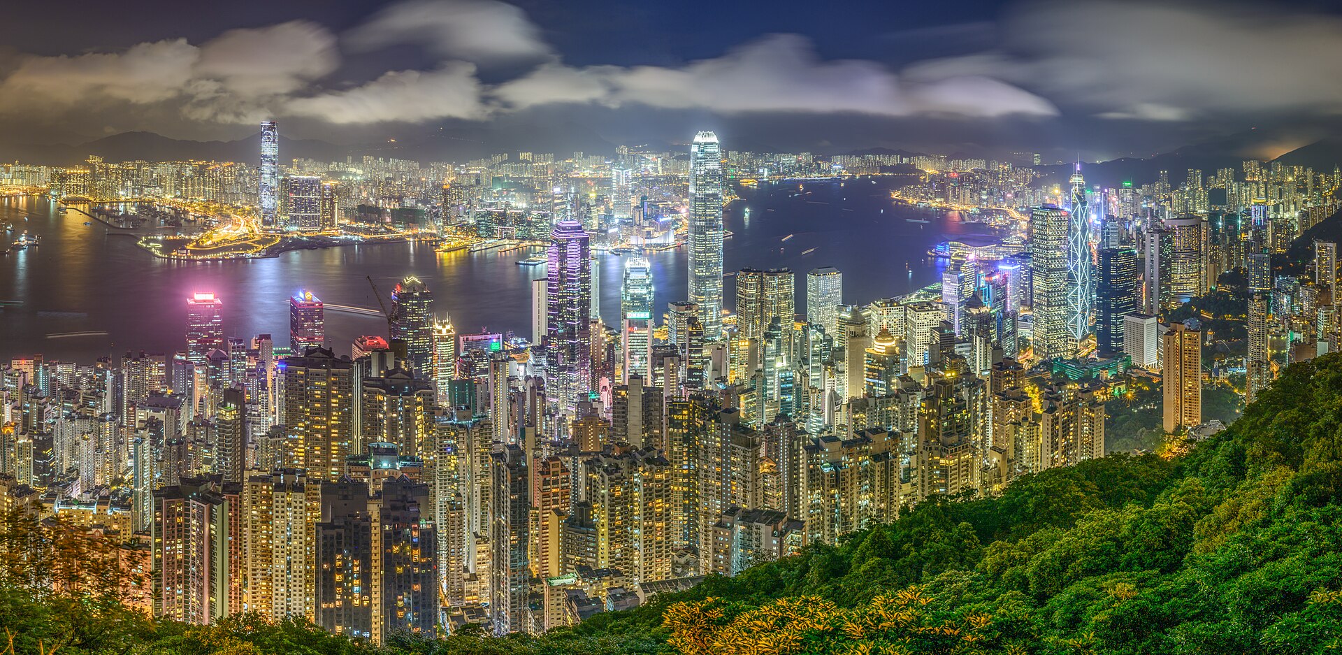 Hong Kong skyline and Victoria Harbour seen from Victoria Peak, showing the skyscrapers of Central where many visitors stay