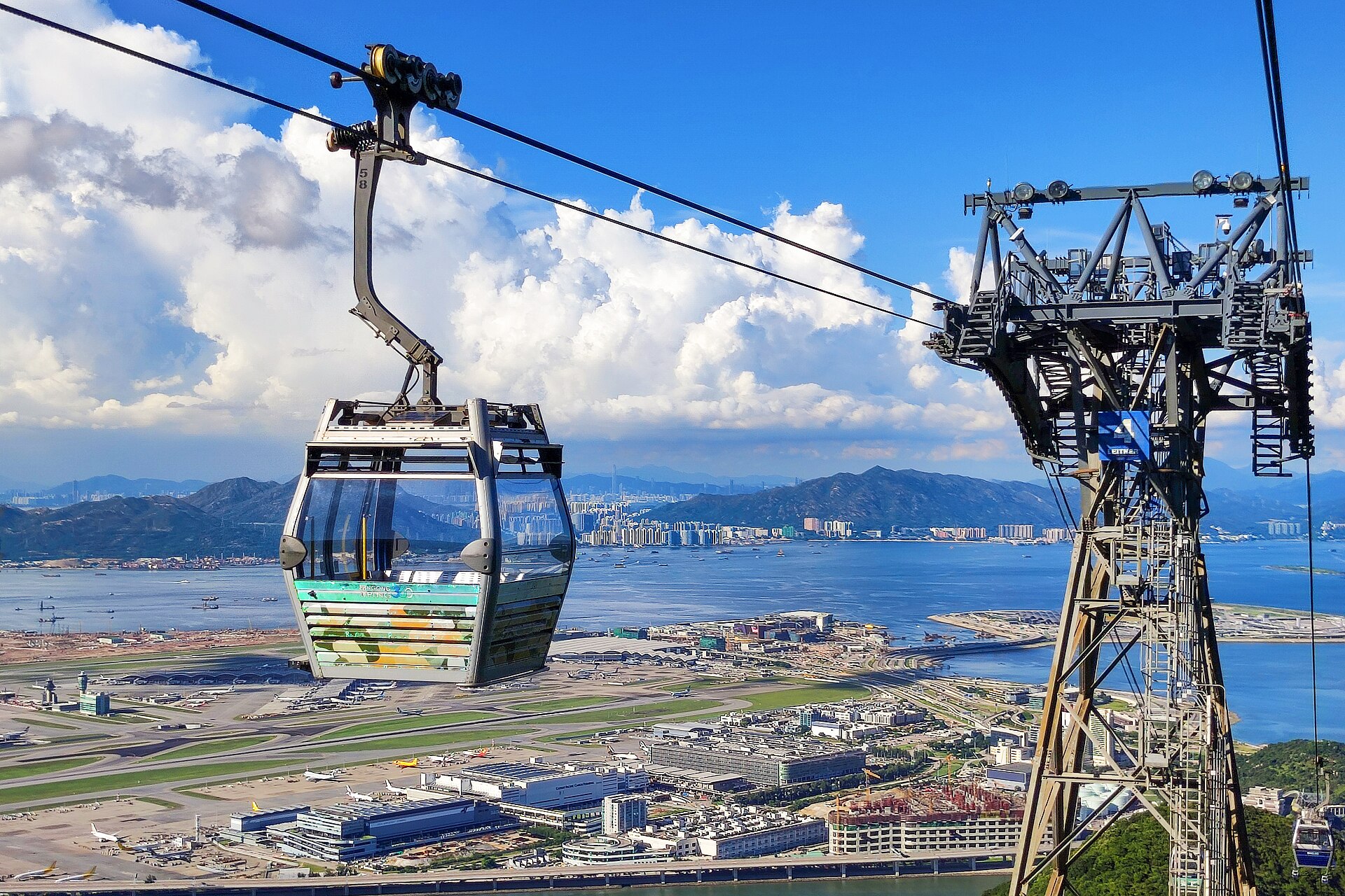 Ngong Ping 360 cable car Hong Kong cabins over Lantau Island