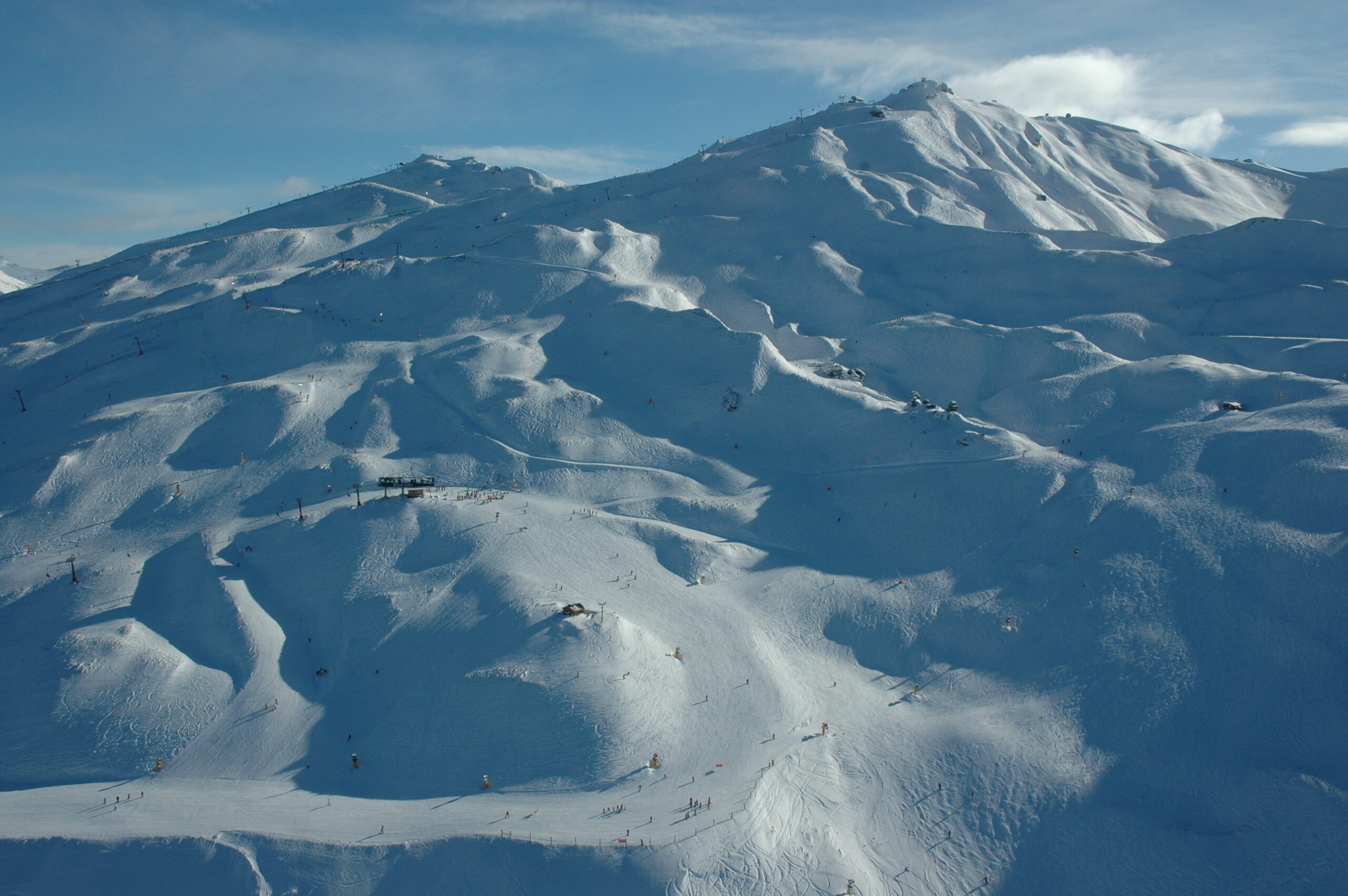Skiers on the slopes at Coronet Peak ski field near Queenstown