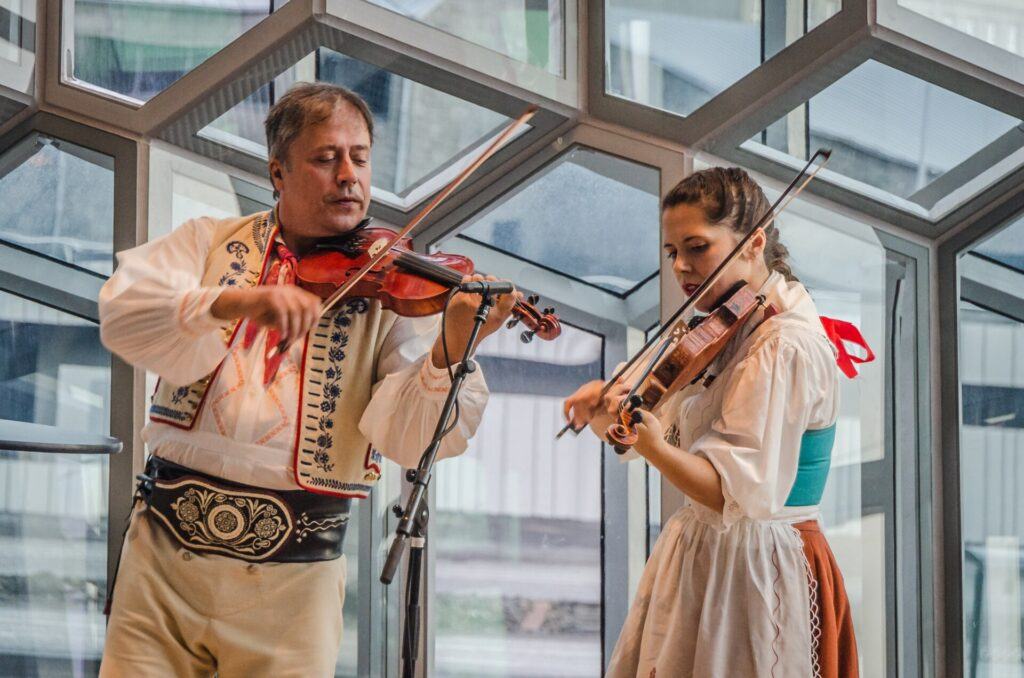 Musicians performing inside Harpa concert hall Reykjavik