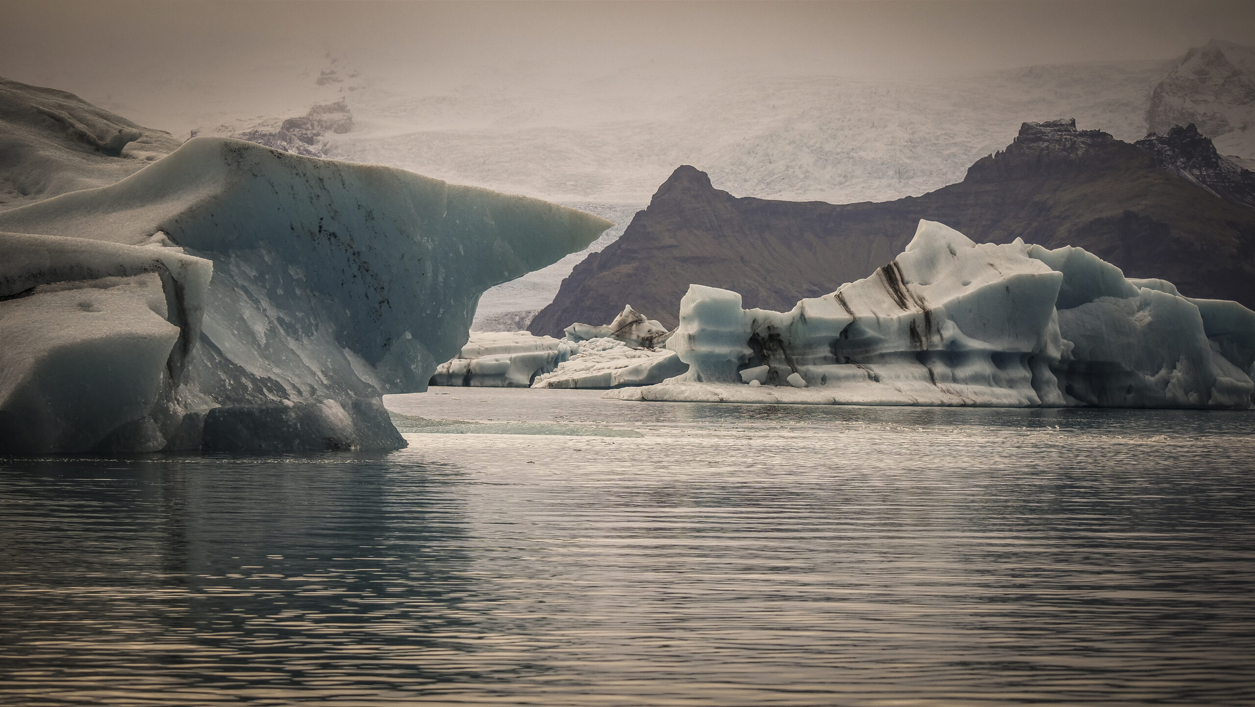 Blue icebergs floating in Jökulsárlón glacier lagoon, Iceland