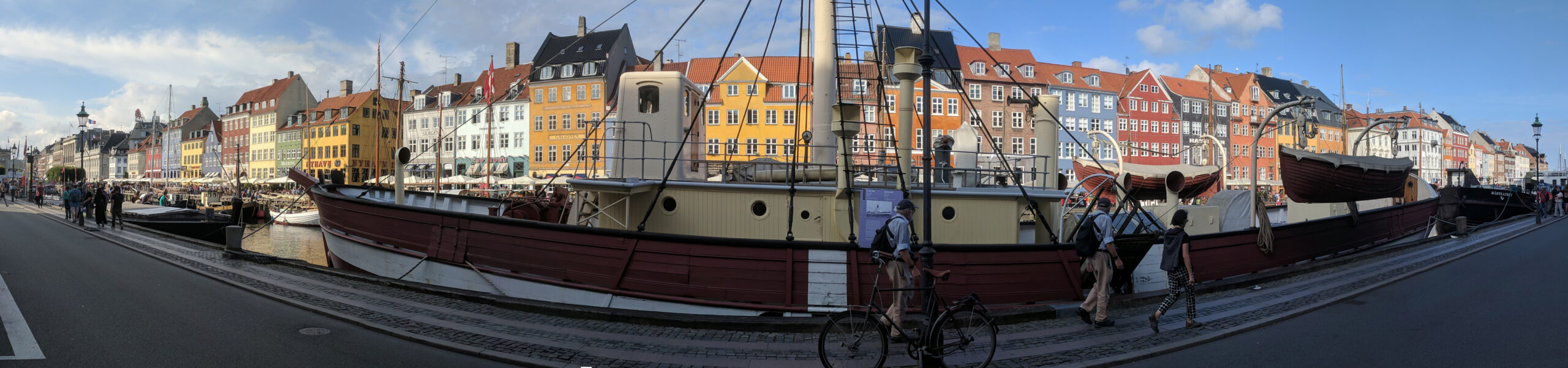 Wide view over Nyhavn harbor and central Copenhagen