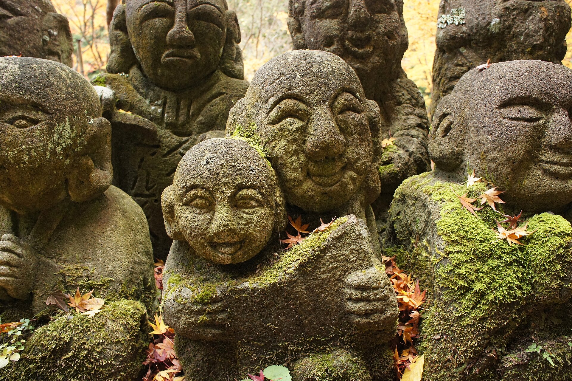 Moss-covered stone statues at Otagi Nenbutsu-ji temple in Kyoto