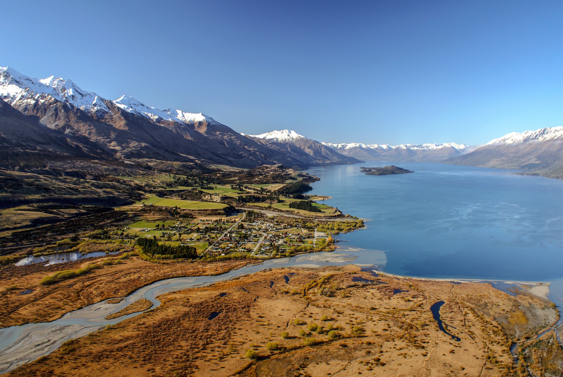 The small town of Glenorchy at the northern end of Lake Wakatipu beneath dramatic mountains
