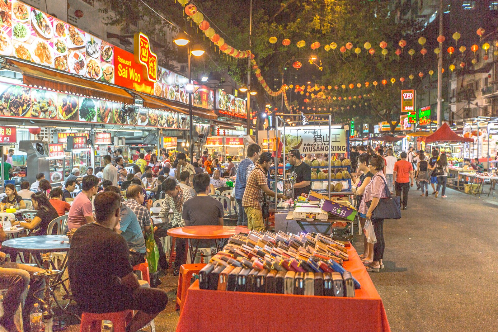 Jalan Alor street food stalls and diners at night in Bukit Bintang, Kuala Lumpur