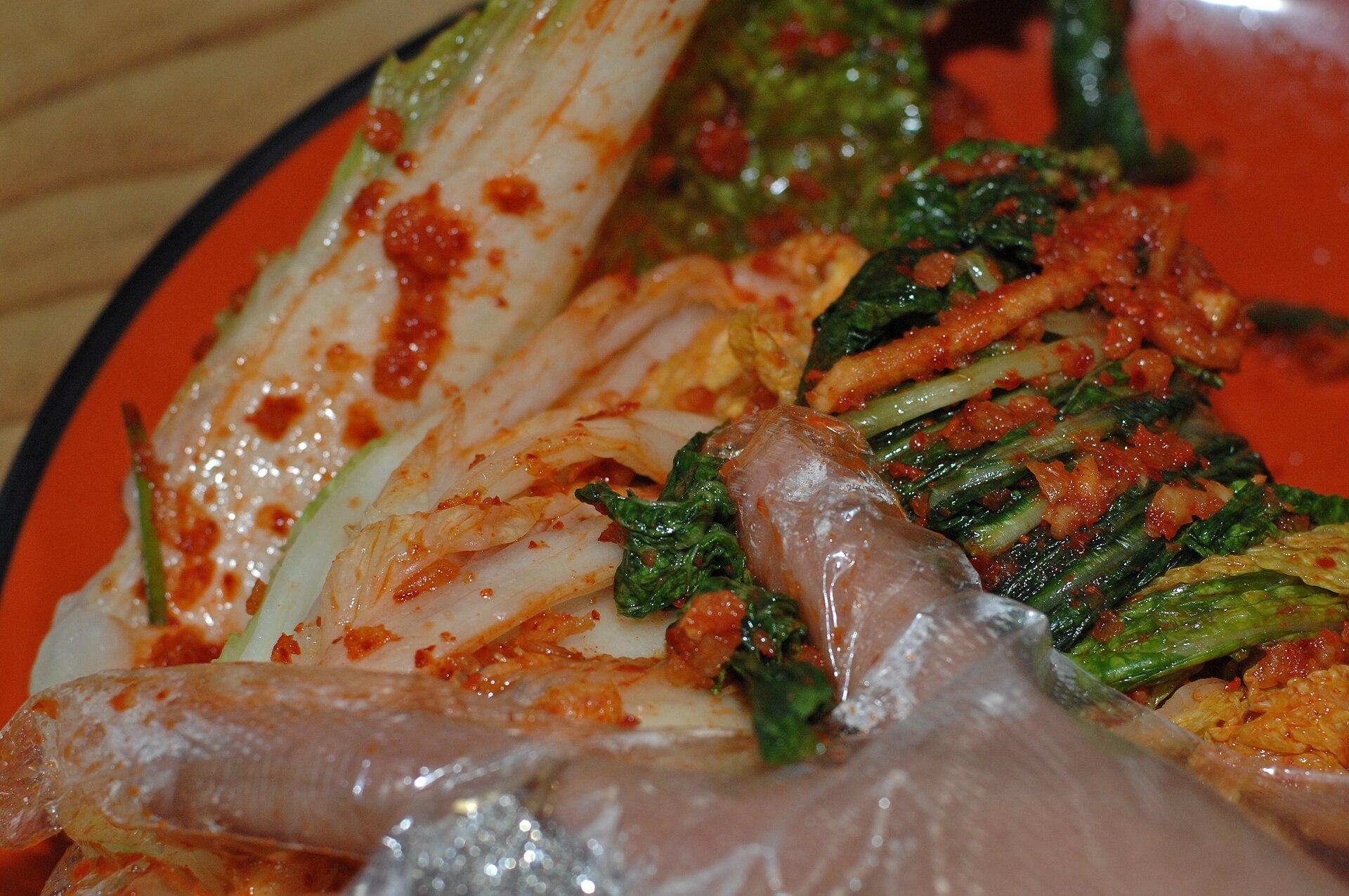 Making kimchi by hand in a Korean cooking class