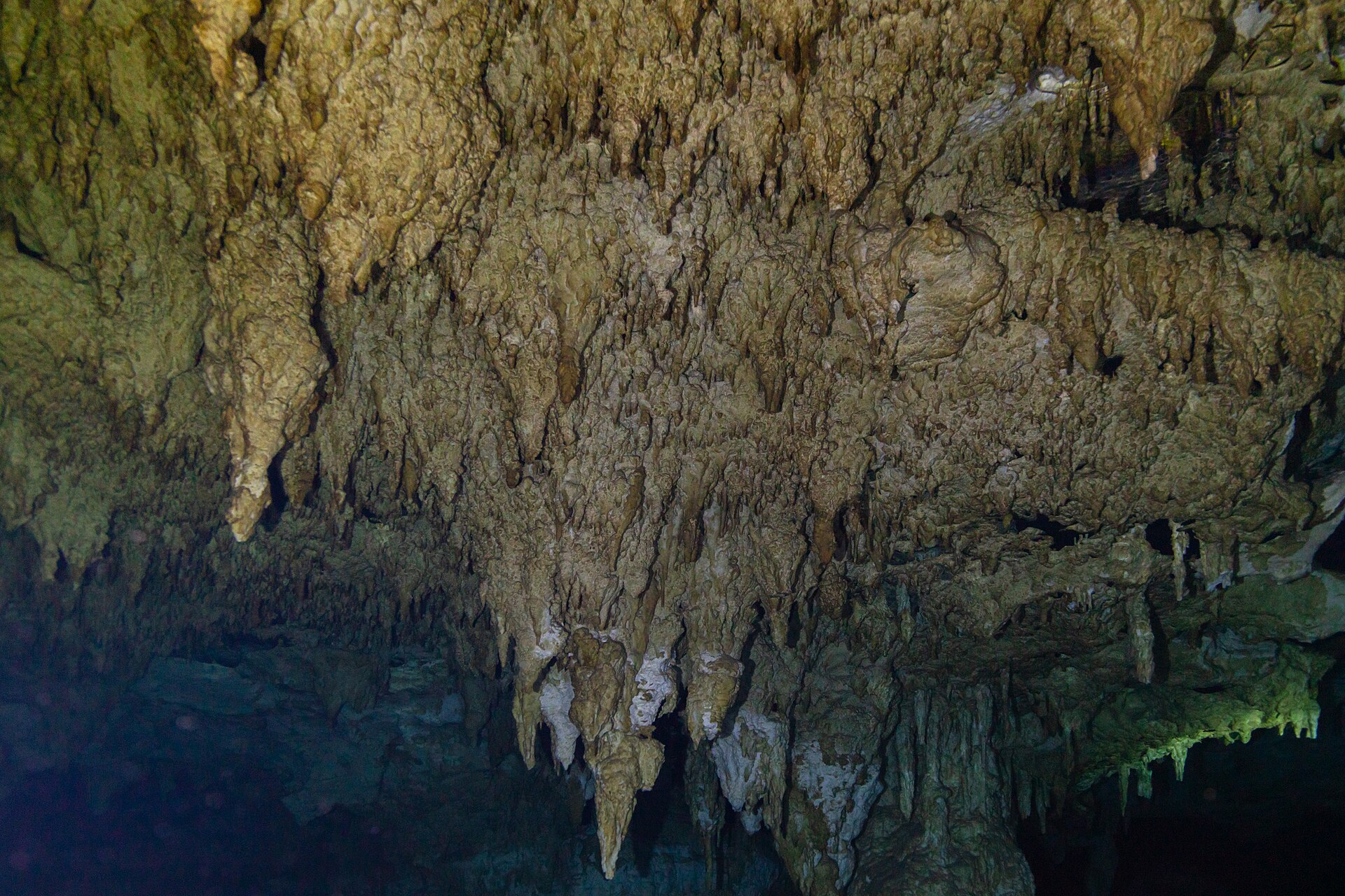 Cenote Dos Ojos near Tulum, blue cavern water with light beams