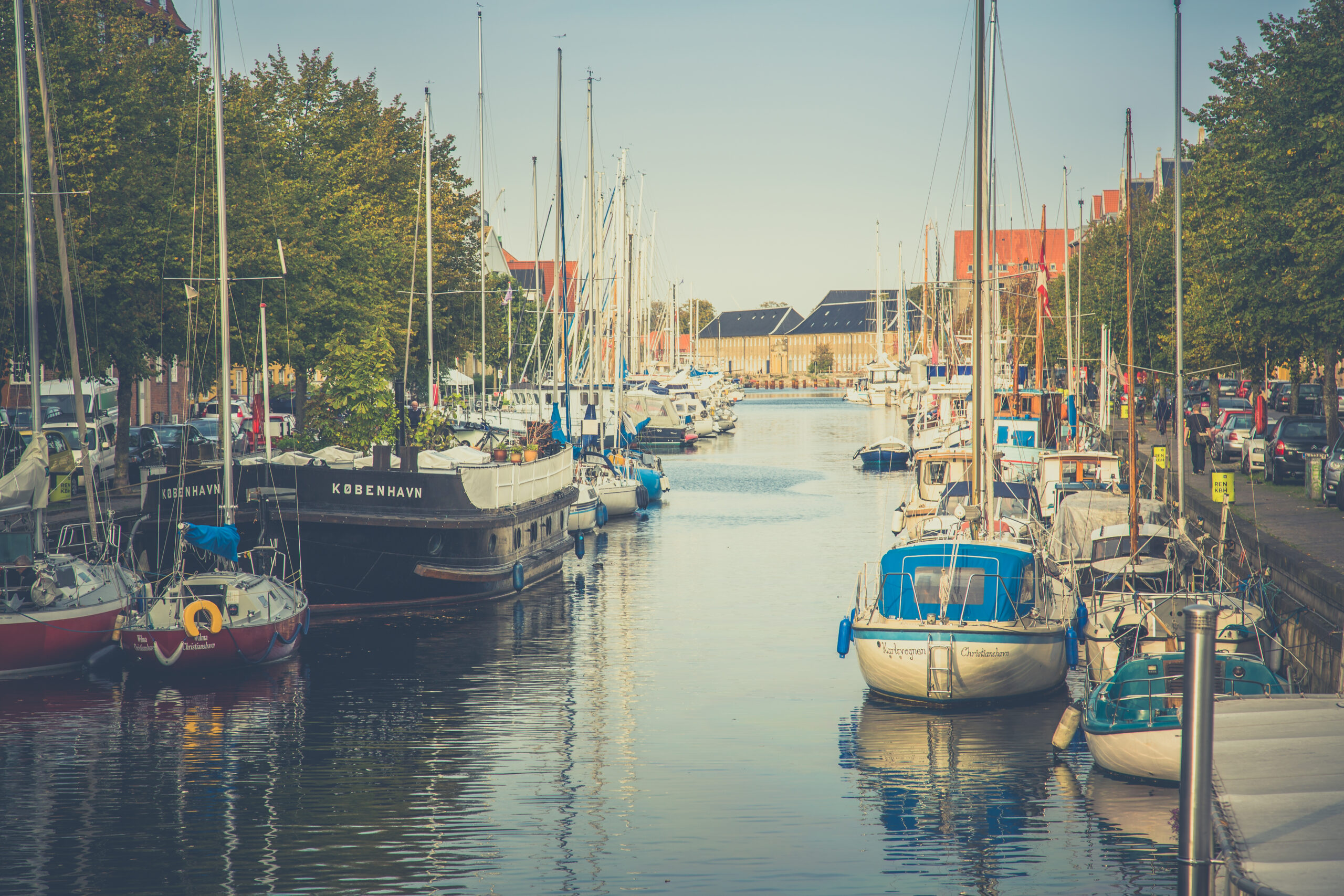 Christianshavn canal with colorful houses and boats in Copenhagen
