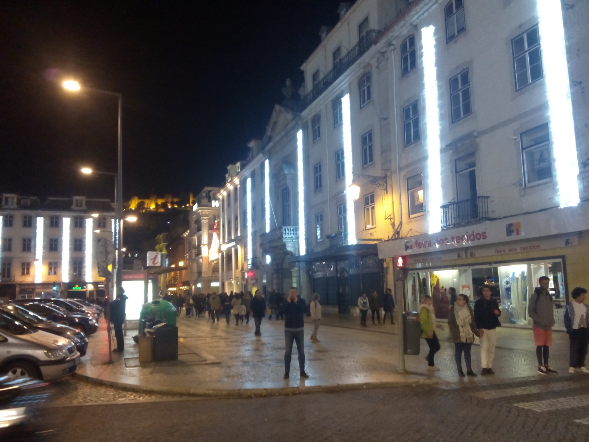 Christmas lights glowing over Rossio square in Lisbon