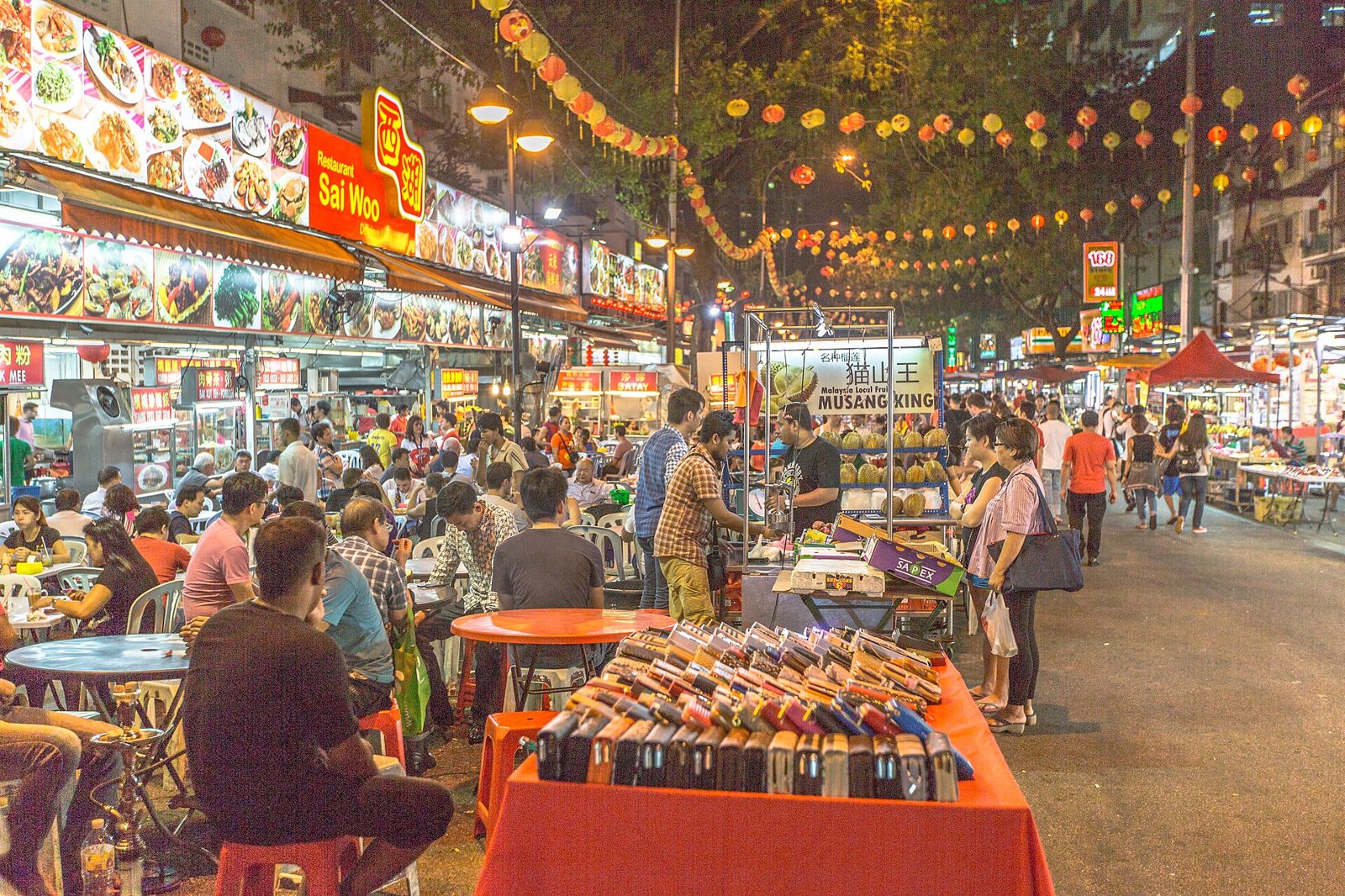 Jalan Alor street food stalls and diners at night in Bukit Bintang, Kuala Lumpur