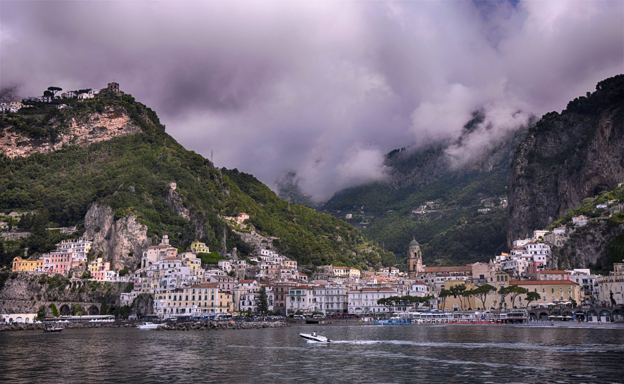 Where to stay on the Amalfi Coast: the town of Amalfi seen from a boat