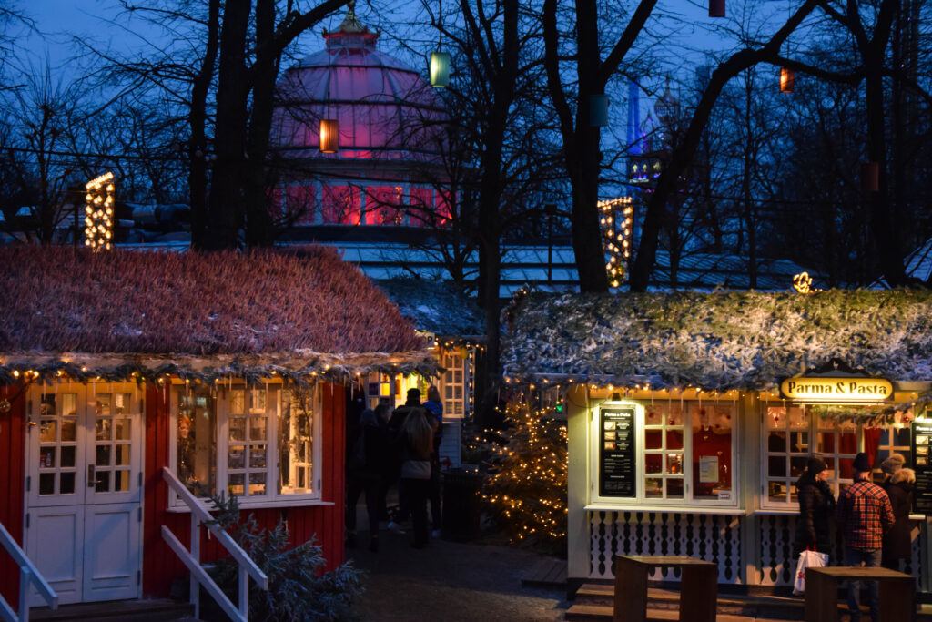 Christmas market stalls at Tivoli Gardens, Copenhagen, at dusk