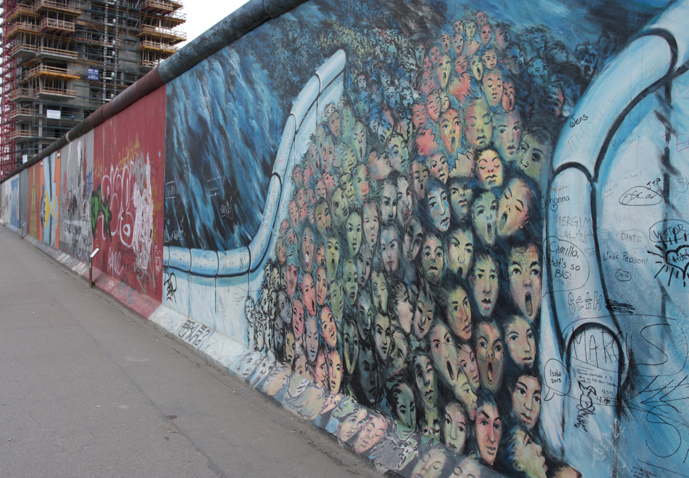 Colorful murals on the East Side Gallery section of the Berlin Wall