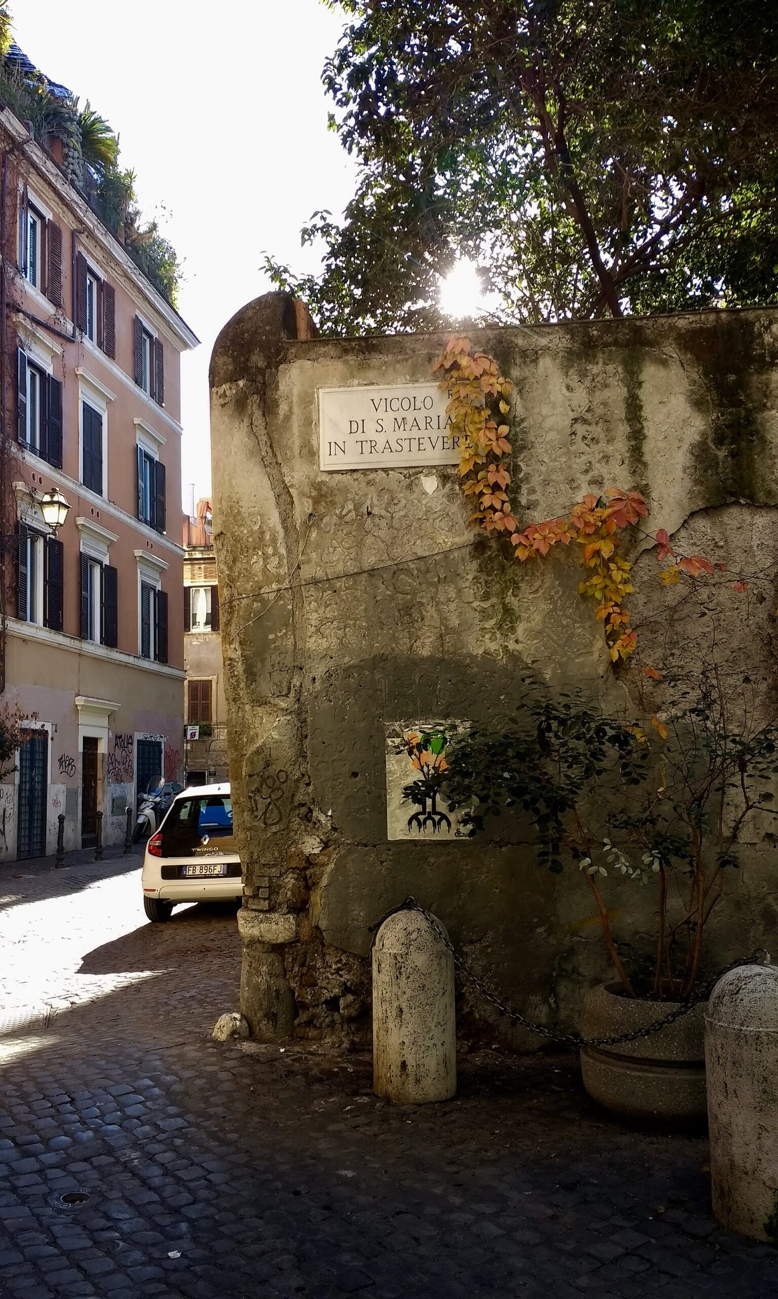 A quiet cobbled street in Trastevere, Rome