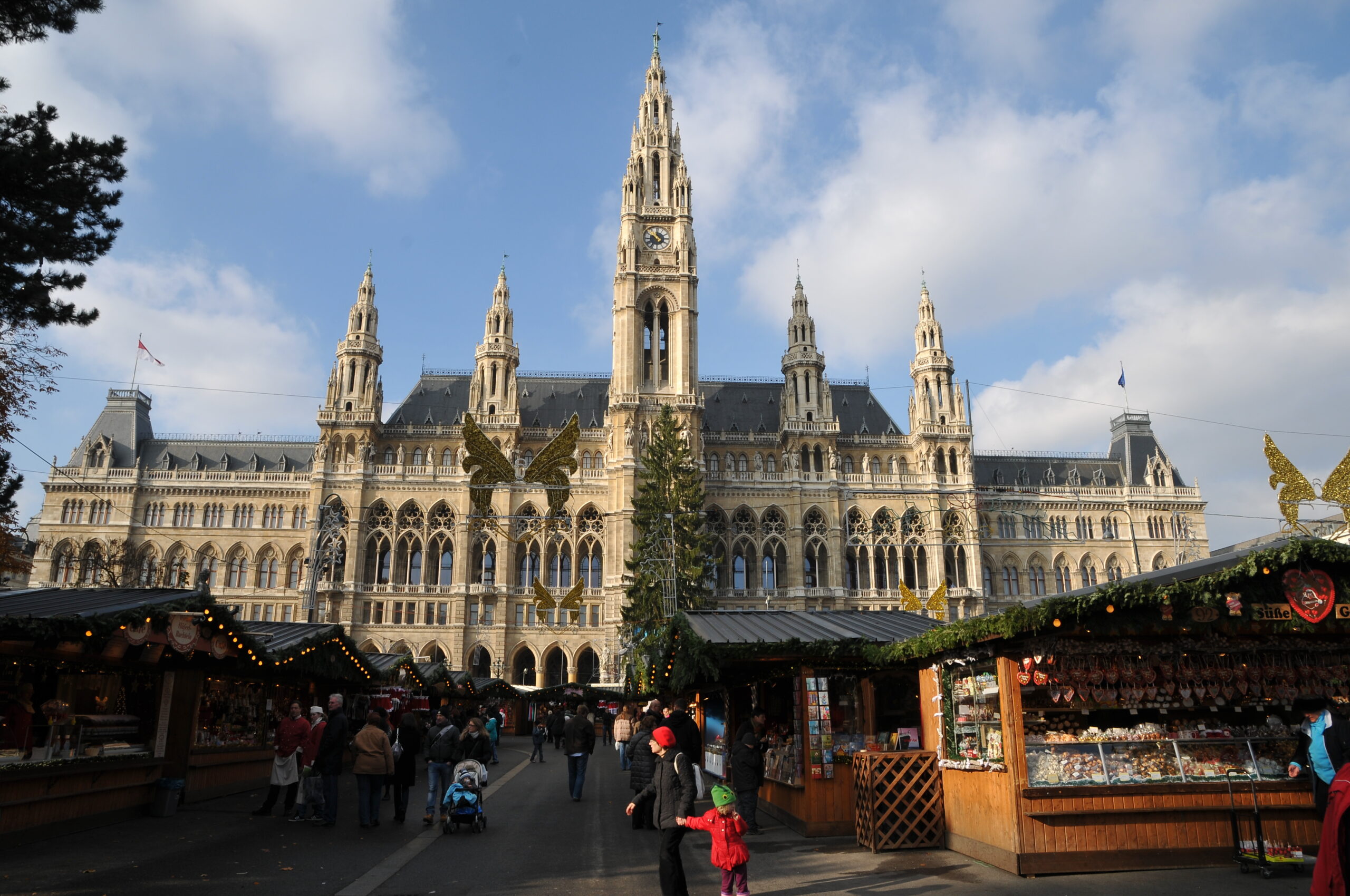 Vienna Christmas market stalls in front of the Rathaus town hall at Rathausplatz